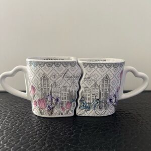 Heart-Handle Amsterdam Floral Ceramic Mug with a blue bicycle.